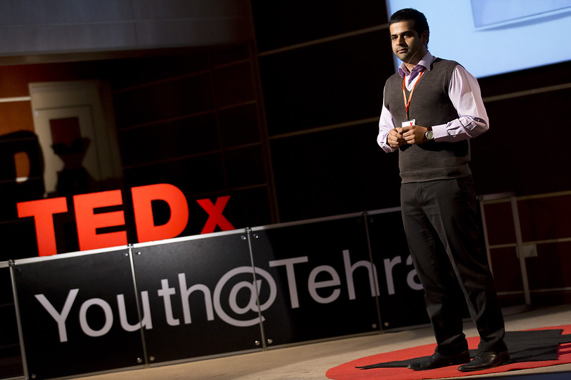 Mohsen Malayeri speaking on the TEDxYouth Tehran stage