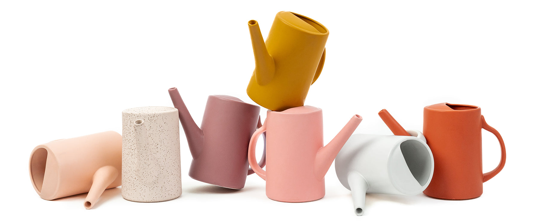 Momma Pots porcelain watering cans in a rainbow of colors