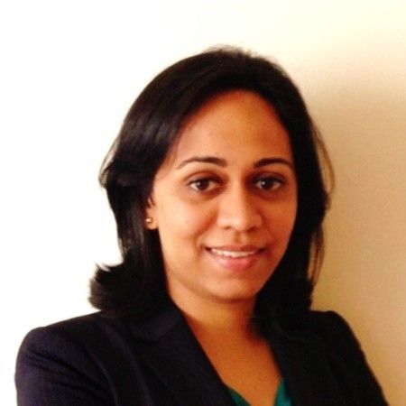 Portrait of Monel Amin, founder and CEO of DiligenceVault