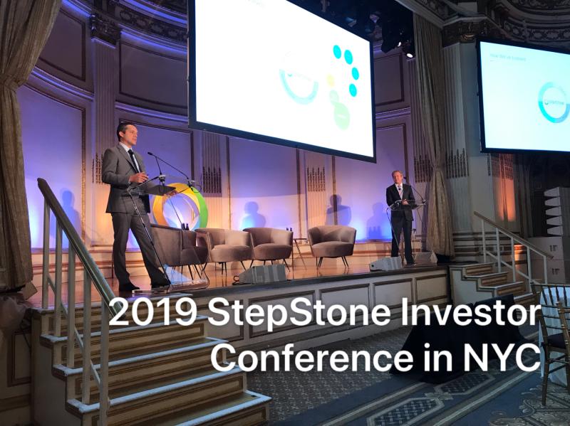 Scott Hart and Monte Brem at separate lecterns during StepStone’s 2019 investor conference at the Plaza Hotel in New York