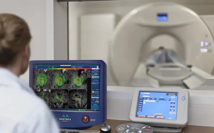 Operator and monitors in an MRI control room