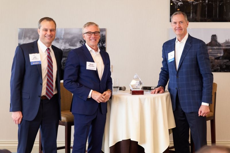 Monty Hamilton, center, with John Yates and John Wichmann at the 2023 John Imlay Leadership Award gathering