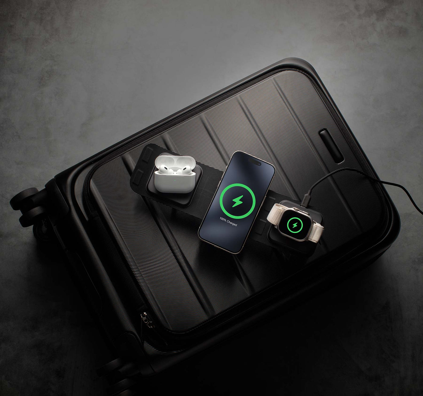 mophie 3-in-1 travel charger folded into a suitcase