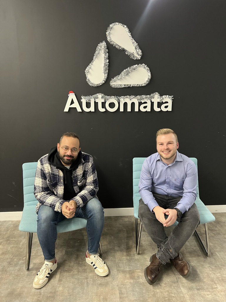 Mostafa ElSayed, left, and Oli seated in turquoise chairs at the Automata office