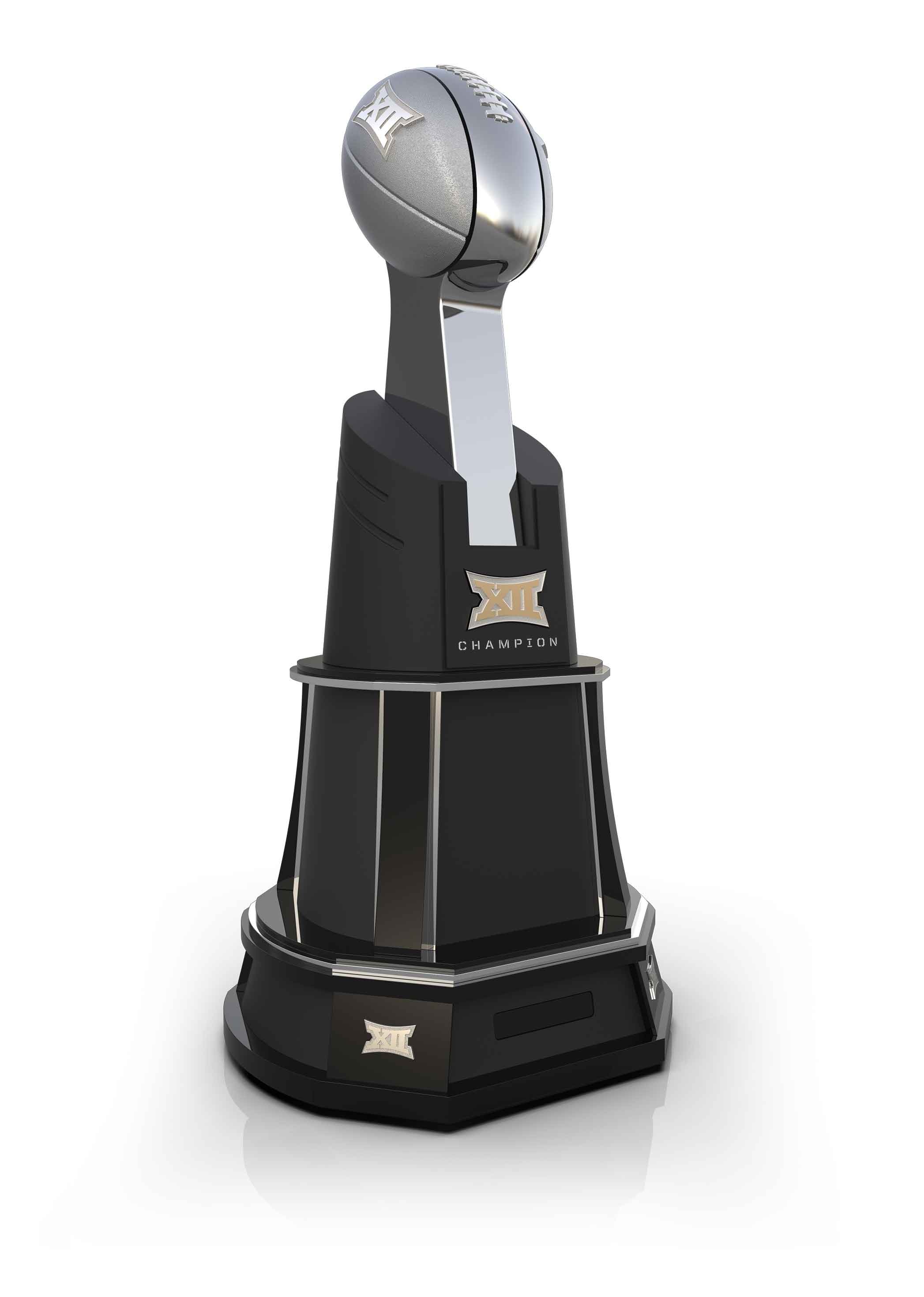 MTM’s Big 12 football championship trophy, with a metallic football atop a dark geometric pedestal
