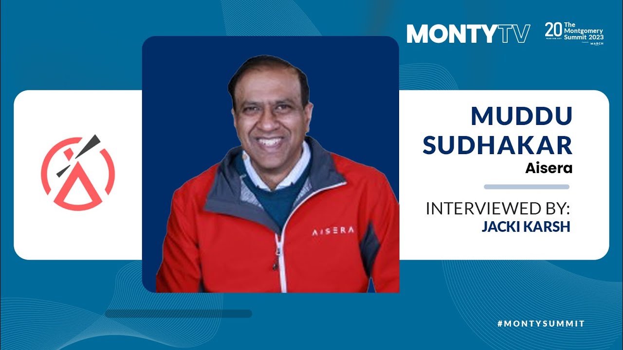 Muddu Sudhakar in a red Aisera jacket in the publicity image for his 2023 Montgomery Summit interview