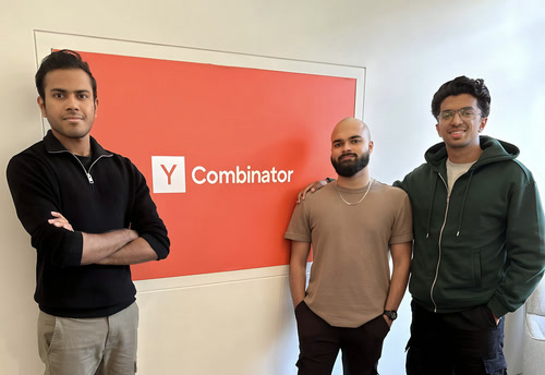 Mufeed VH with his co-founders in front of a Y Combinator sign