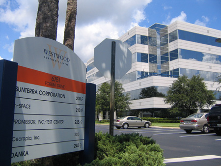 Period photograph of n-Space’s office building and tenant sign in Orlando