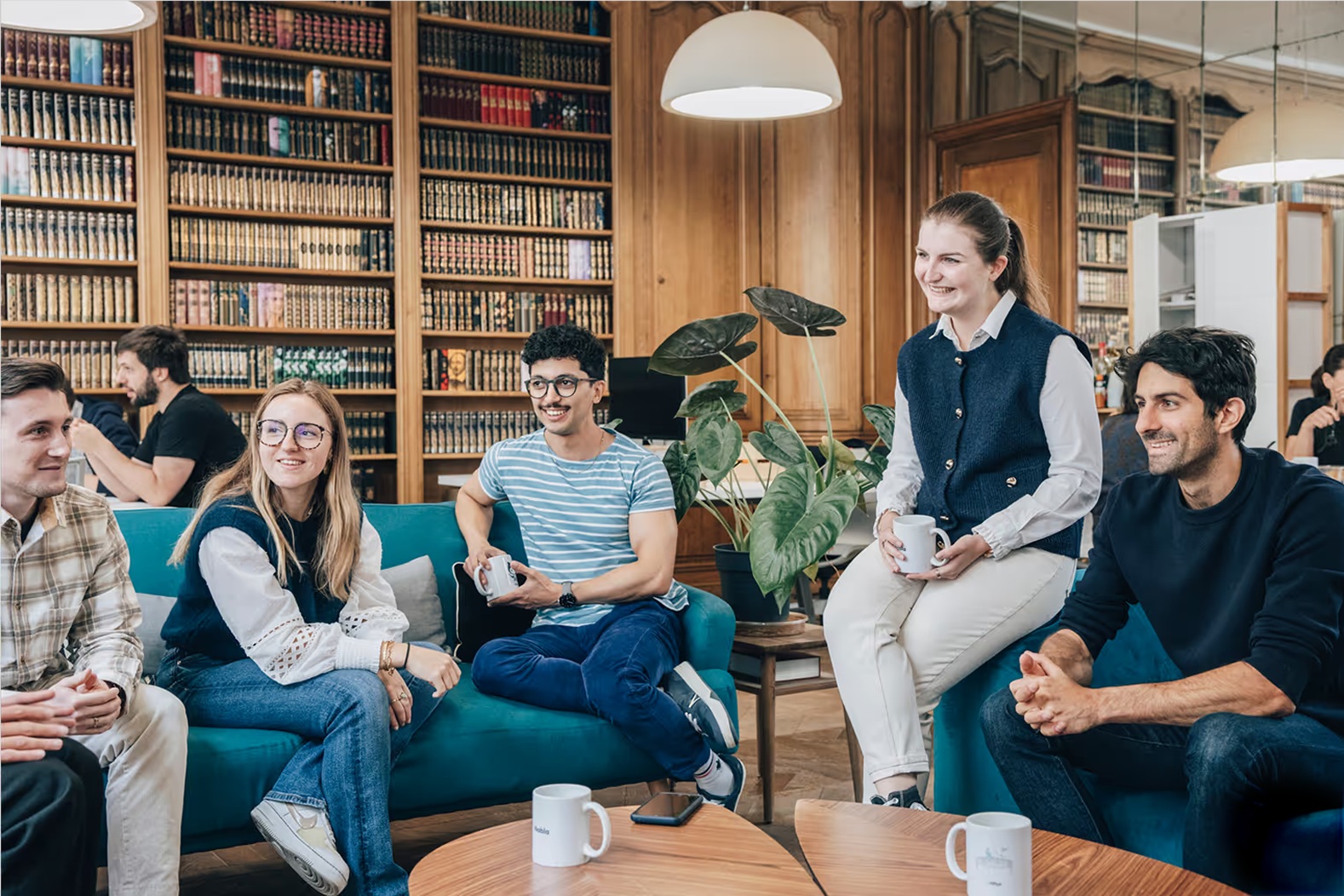 Members of the Nabla team gathered together in an office