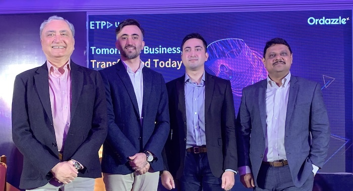 Naresh Ahuja, Neev Ahuja, Veer Ahuja and Bhavesh Doshi standing together at the India platform launch