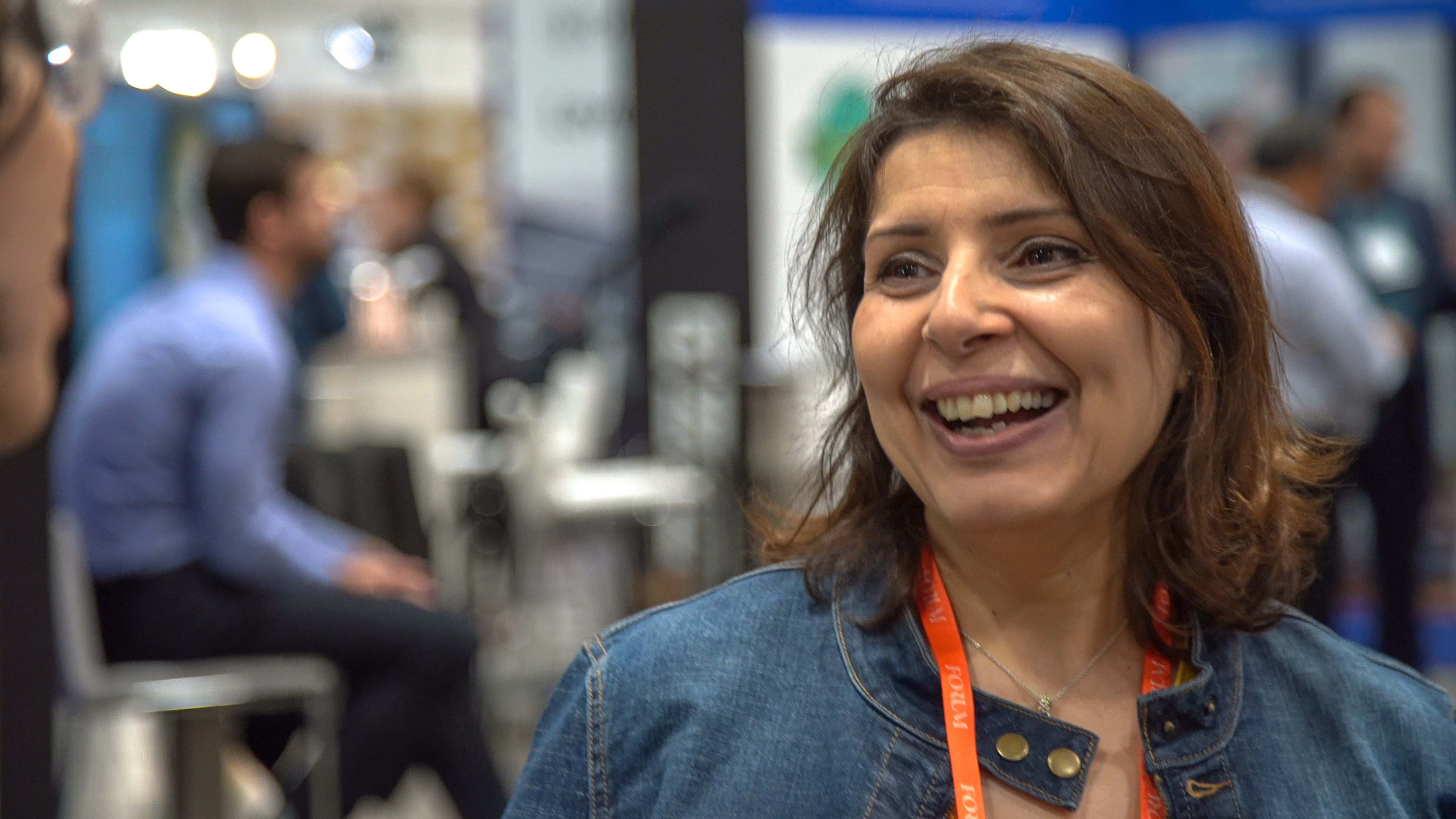 Narjès Boufaden smiling during a conversation at Collision 2019