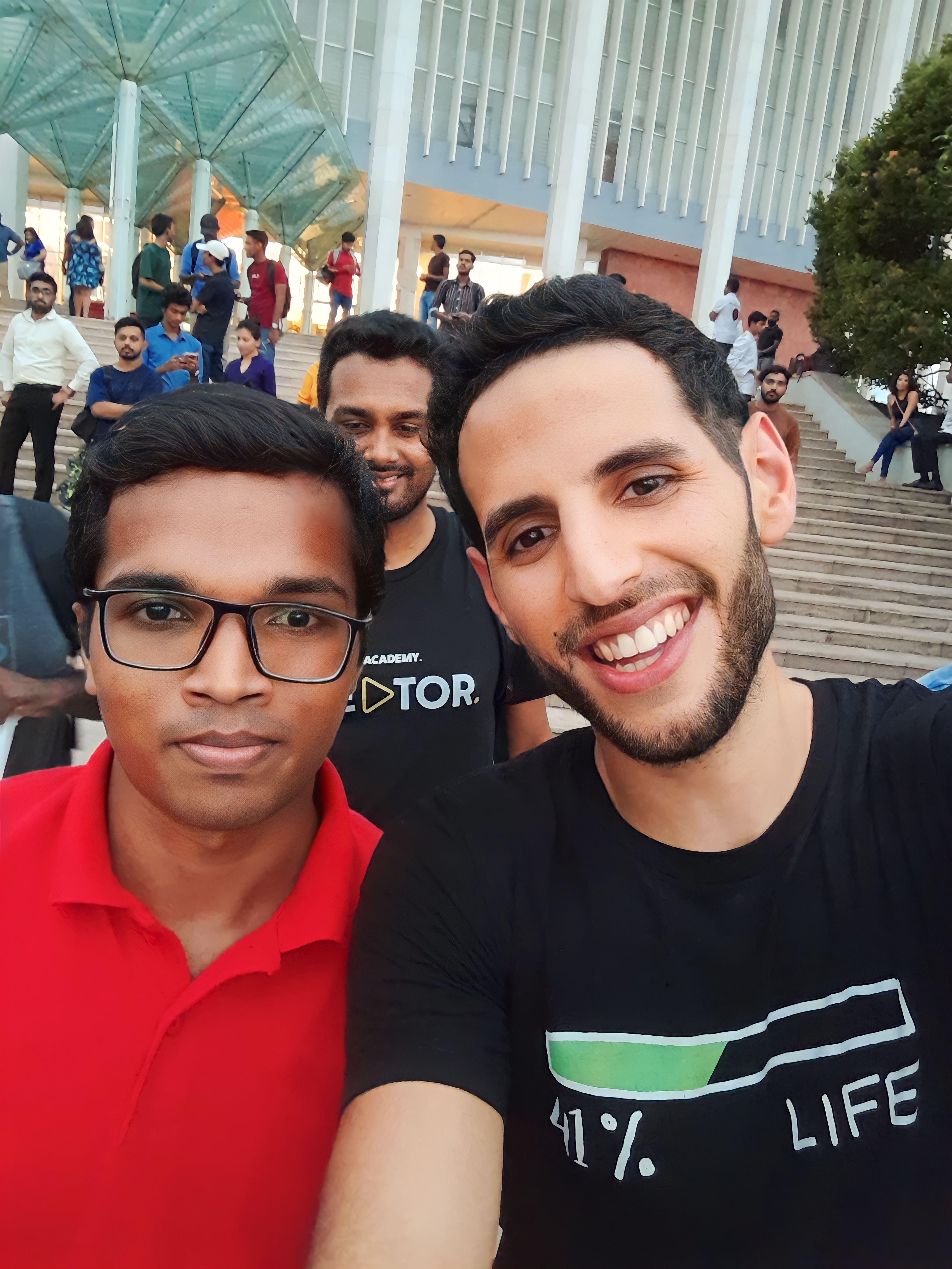 Nuseir Yassin smiles for a selfie with attendees at a Nas Daily meetup in Sri Lanka
