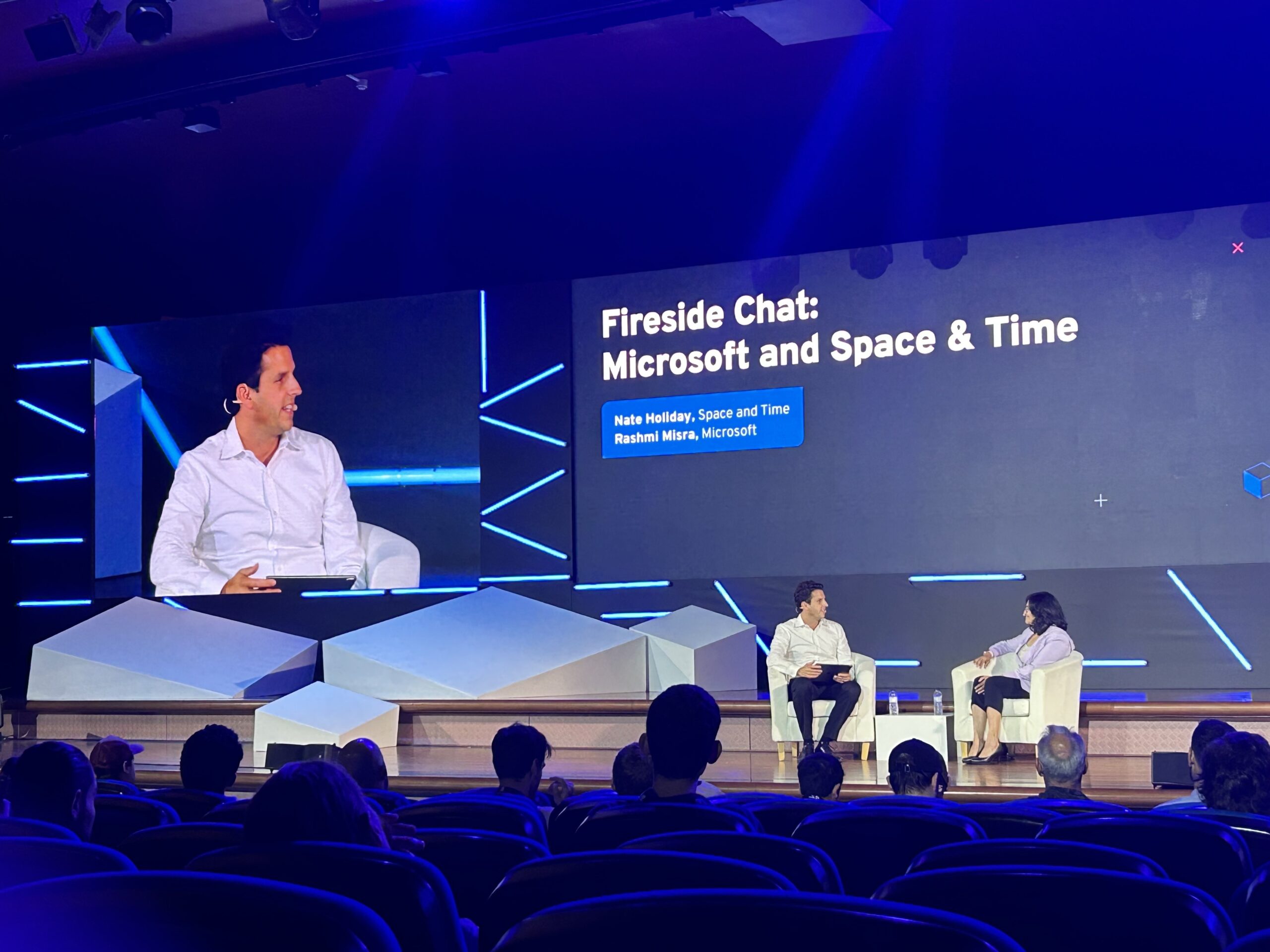 Nate Holiday and Microsoft’s Rashmi Misra in a fireside chat onstage at SmartCon