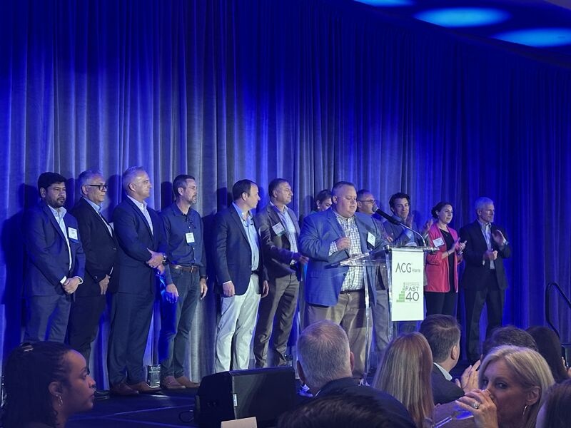 SplashBI team members on stage during the 2025 Georgia Fast 40 awards celebration