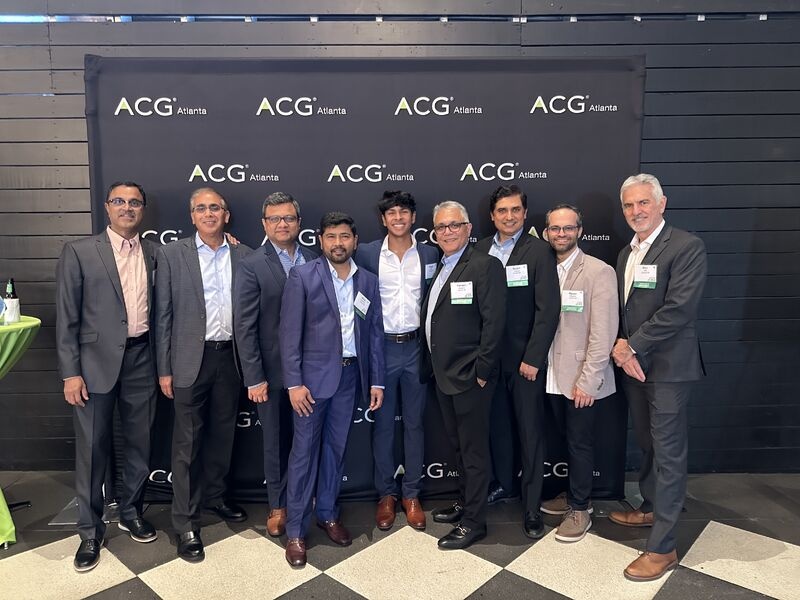 Naveen Miglani with SplashBI co-founder Kiran Reddy Pasham and colleagues at the 2025 Georgia Fast 40 celebration