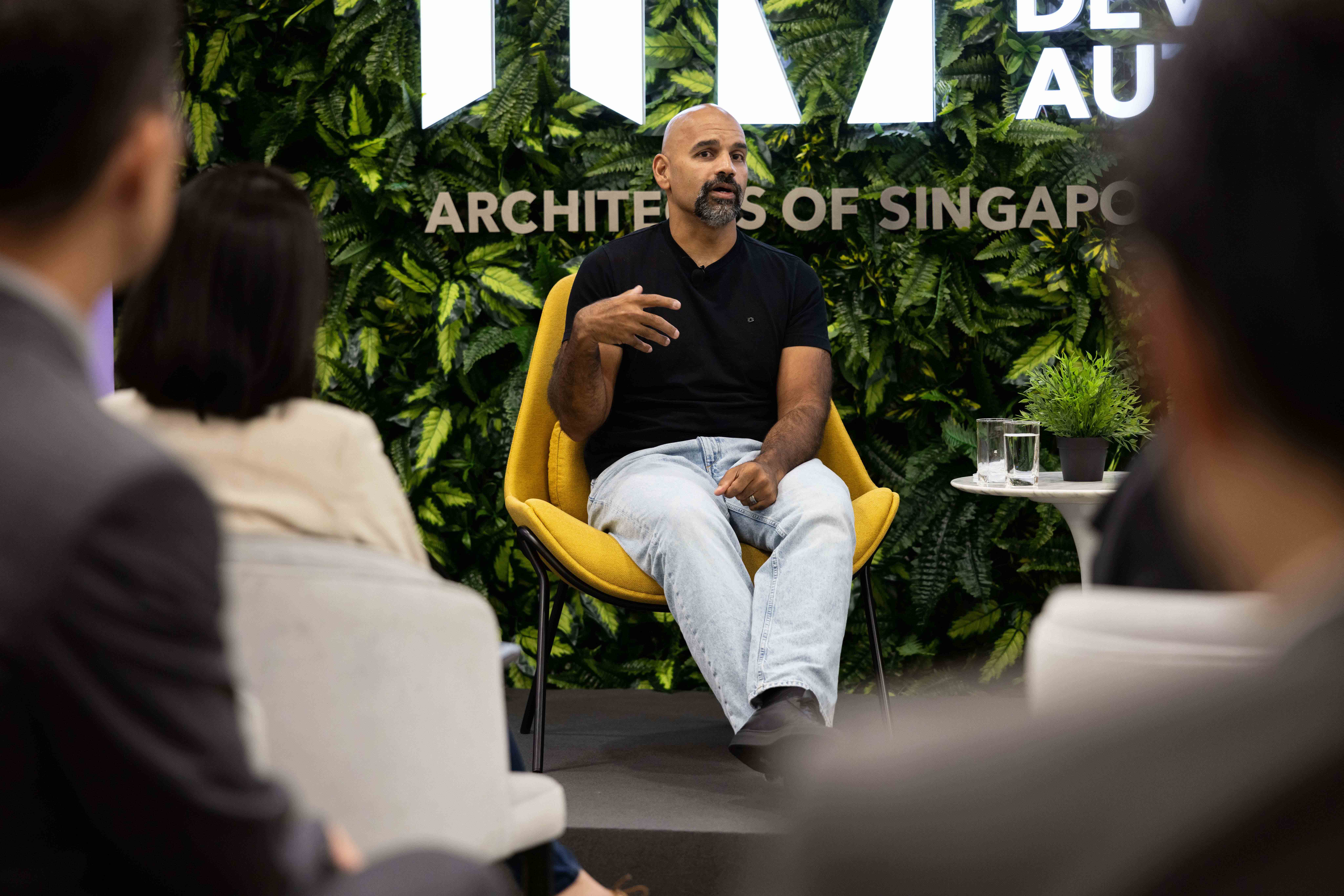 Naveen Rao speaking from a yellow chair at ATxSummit 2026 in Singapore