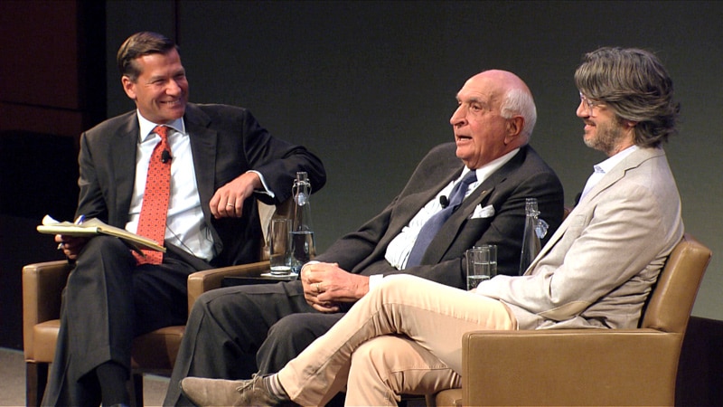 Neal Goldman, seated at right, in conversation with Ken Langone at a Goldman Sachs event