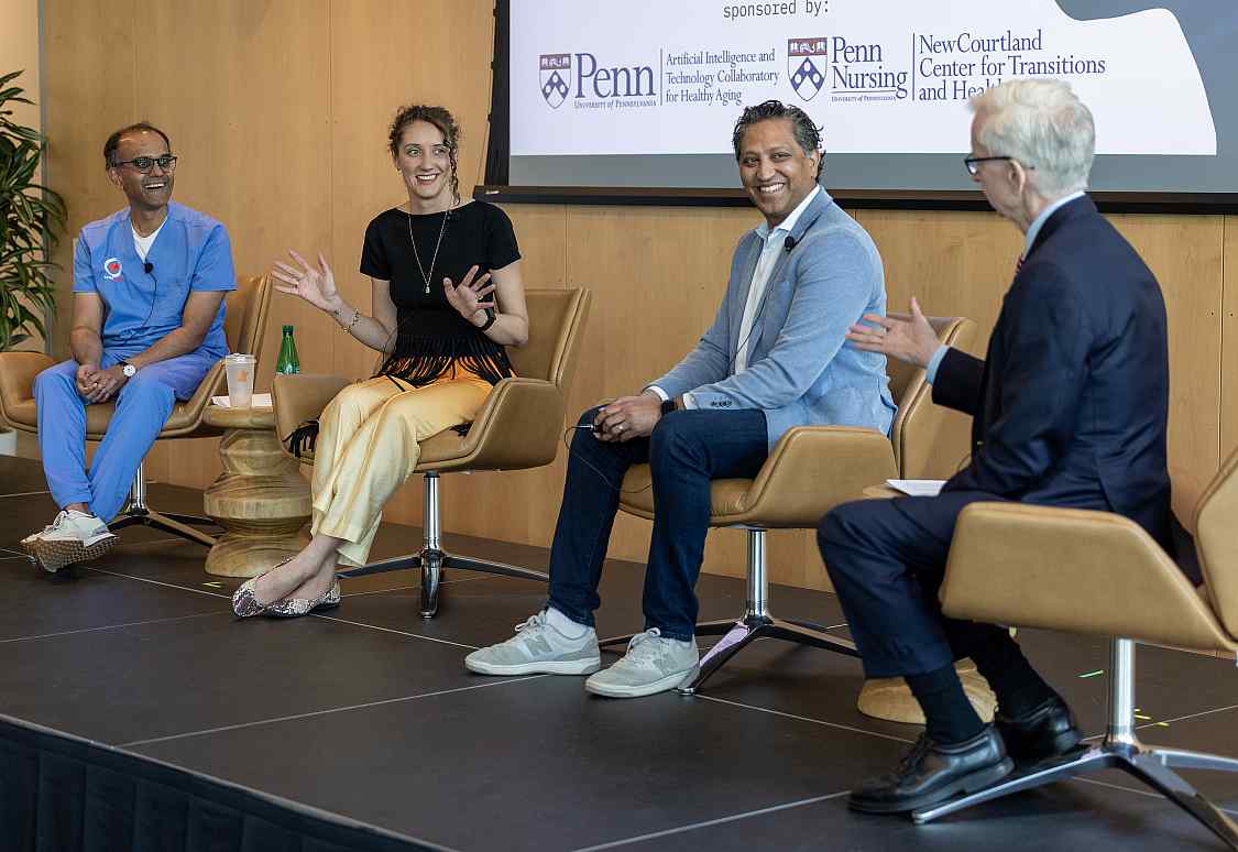 Neal Shah, at left, joins Tatiana Fofanova, Ashish Shah and John Rydzewski for a seated panel discussion.
