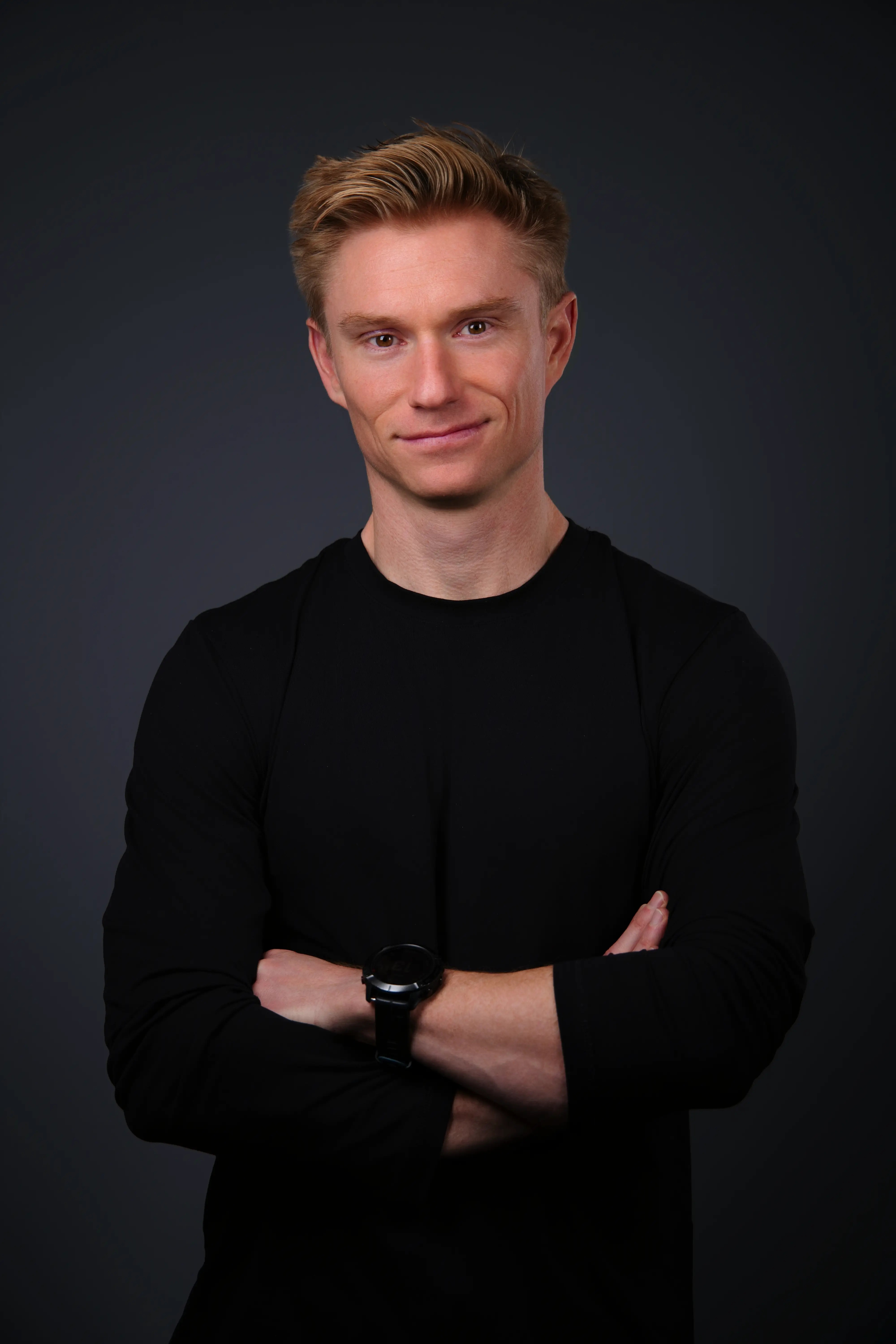 Nebulock founder and CEO Damien Lewke, standing with his arms crossed
