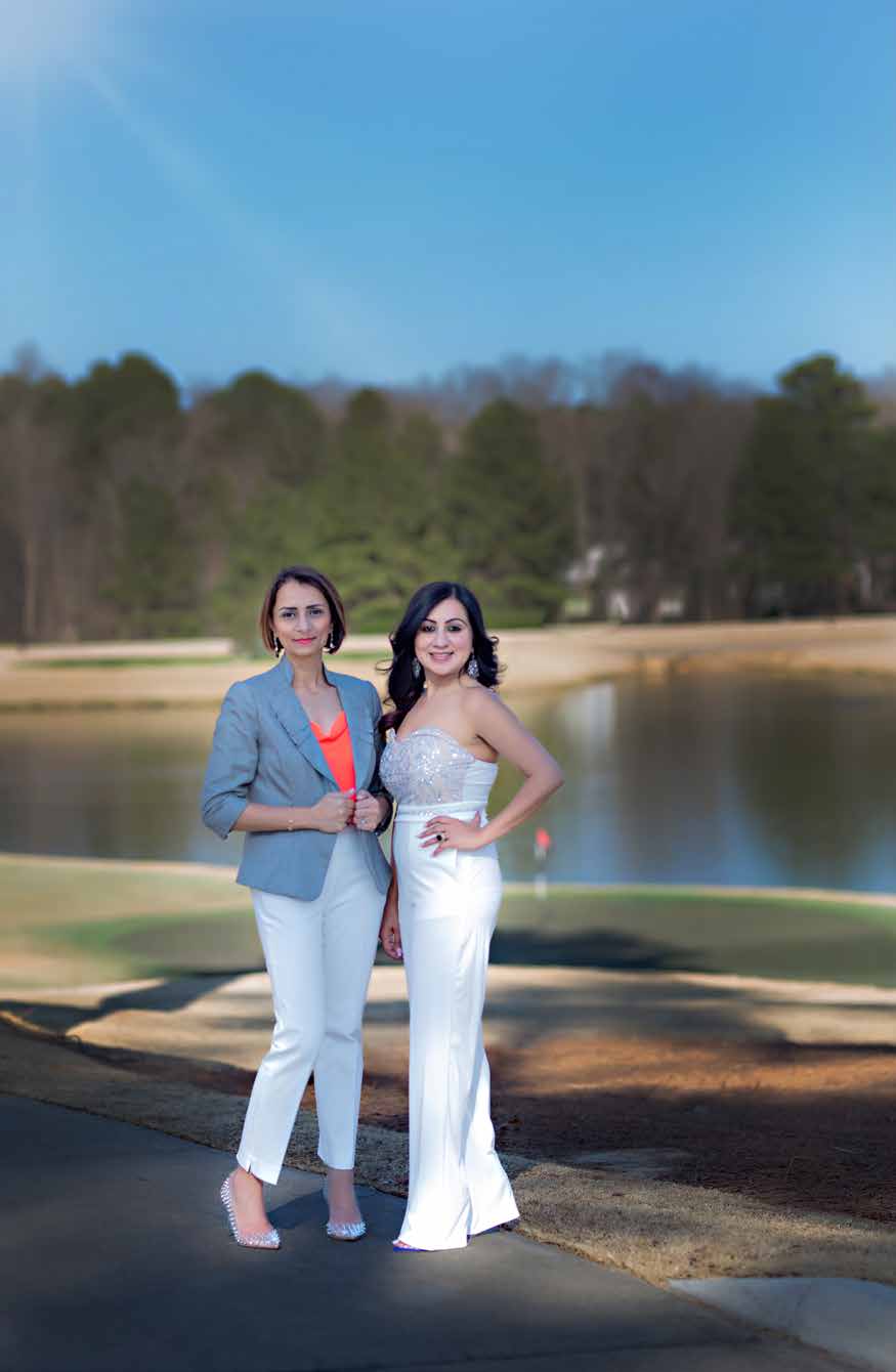 Neha Avasthi, left, and Shikha Anand standing together at Governors Club