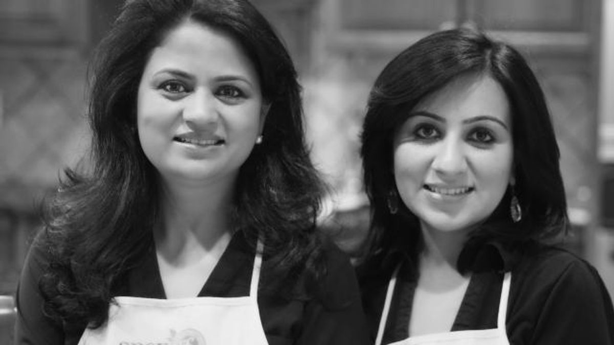 Anupama Singh and Neha Avasthi wearing aprons for their Apex Food Company venture