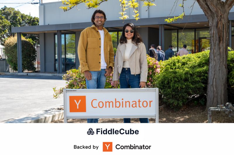Kaushik Srinivasan and Neha Nupoor standing behind a Y Combinator sign at the FiddleCube launch