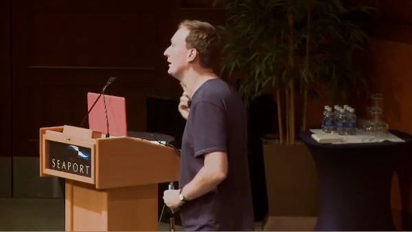Neil Davidson speaking beside the lectern at Business of Software USA 2010