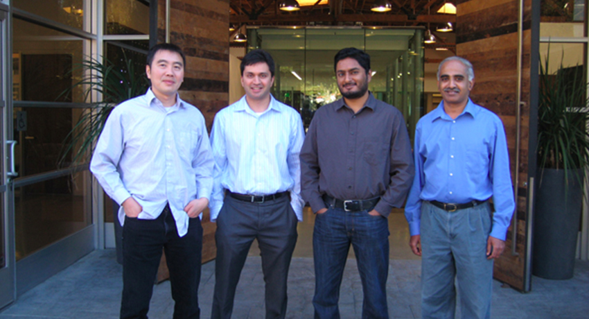 Netskope's four-person founding team standing outside an office
