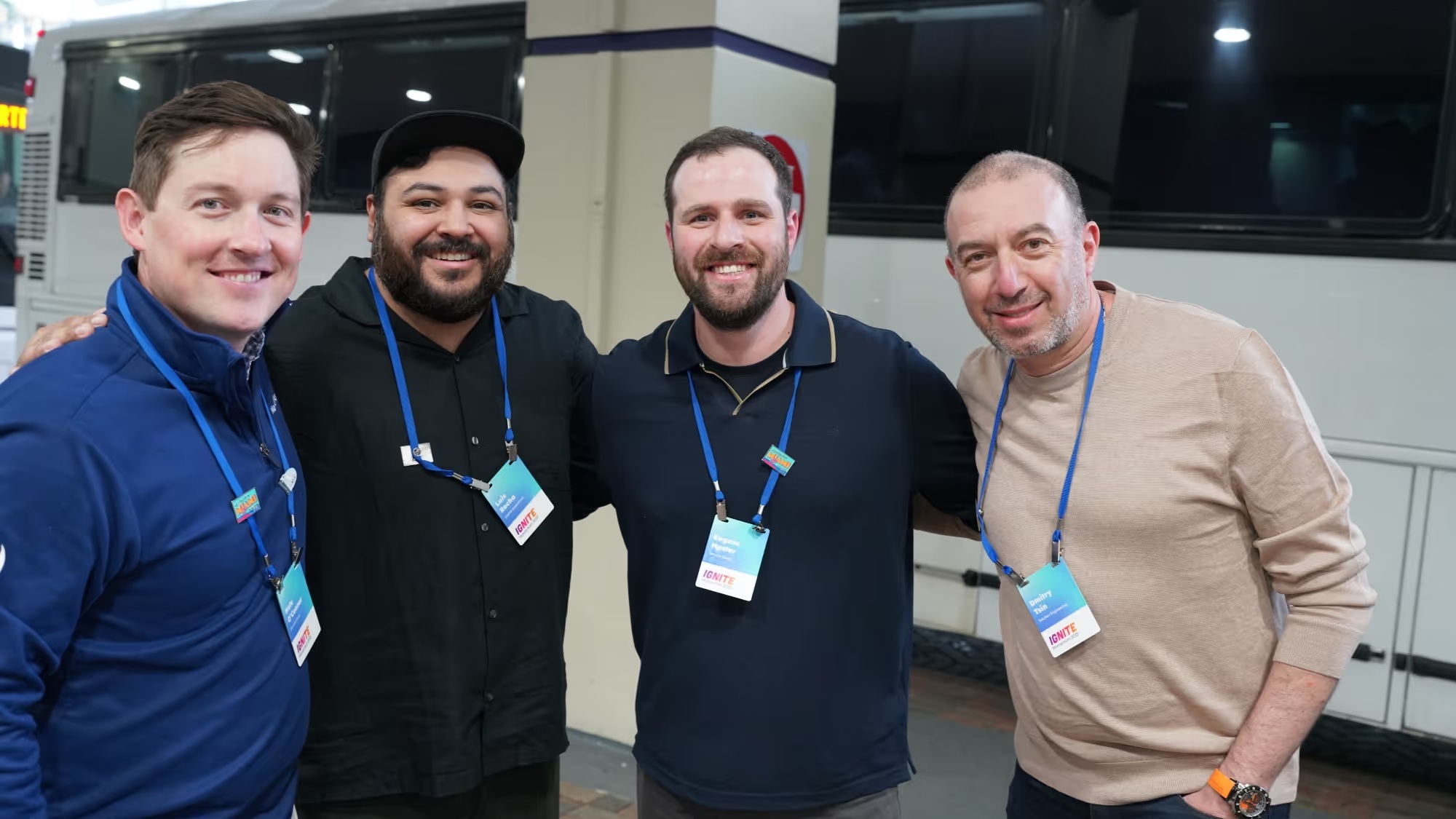 Four attendees pictured together in NeuraFlash’s company team gallery