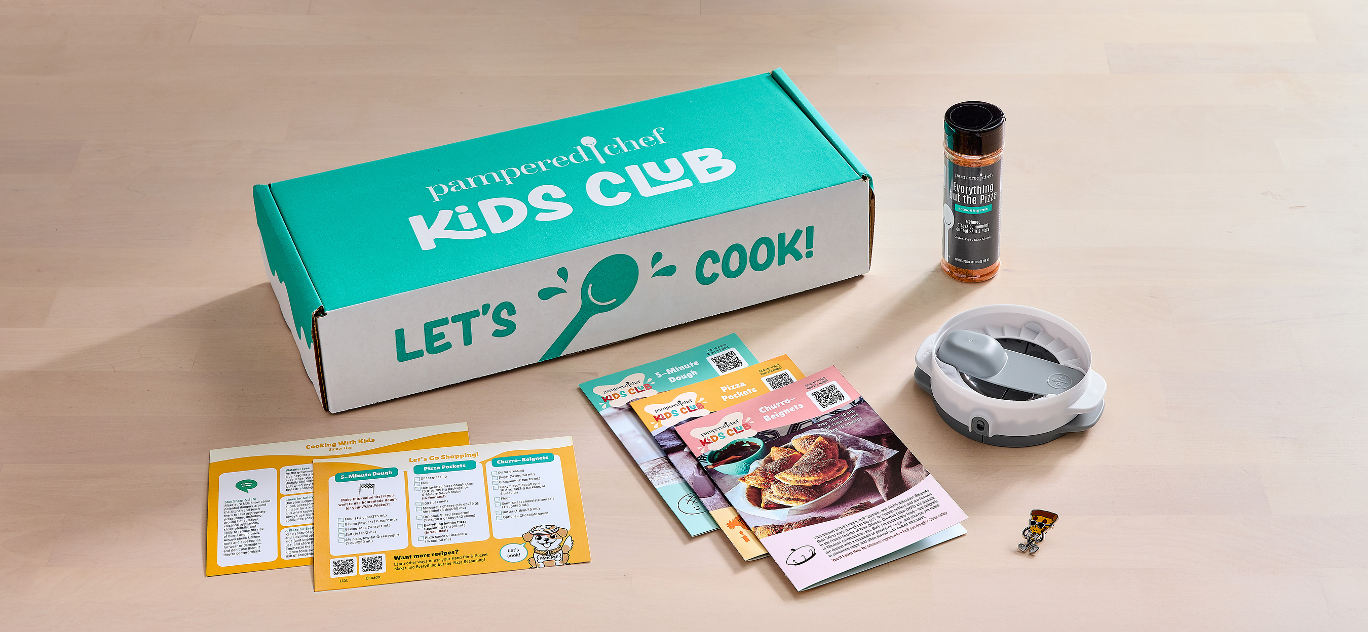 Pampered Chef’s Dough Much Fun Kids Club box, recipe materials, kitchen tool and seasoning