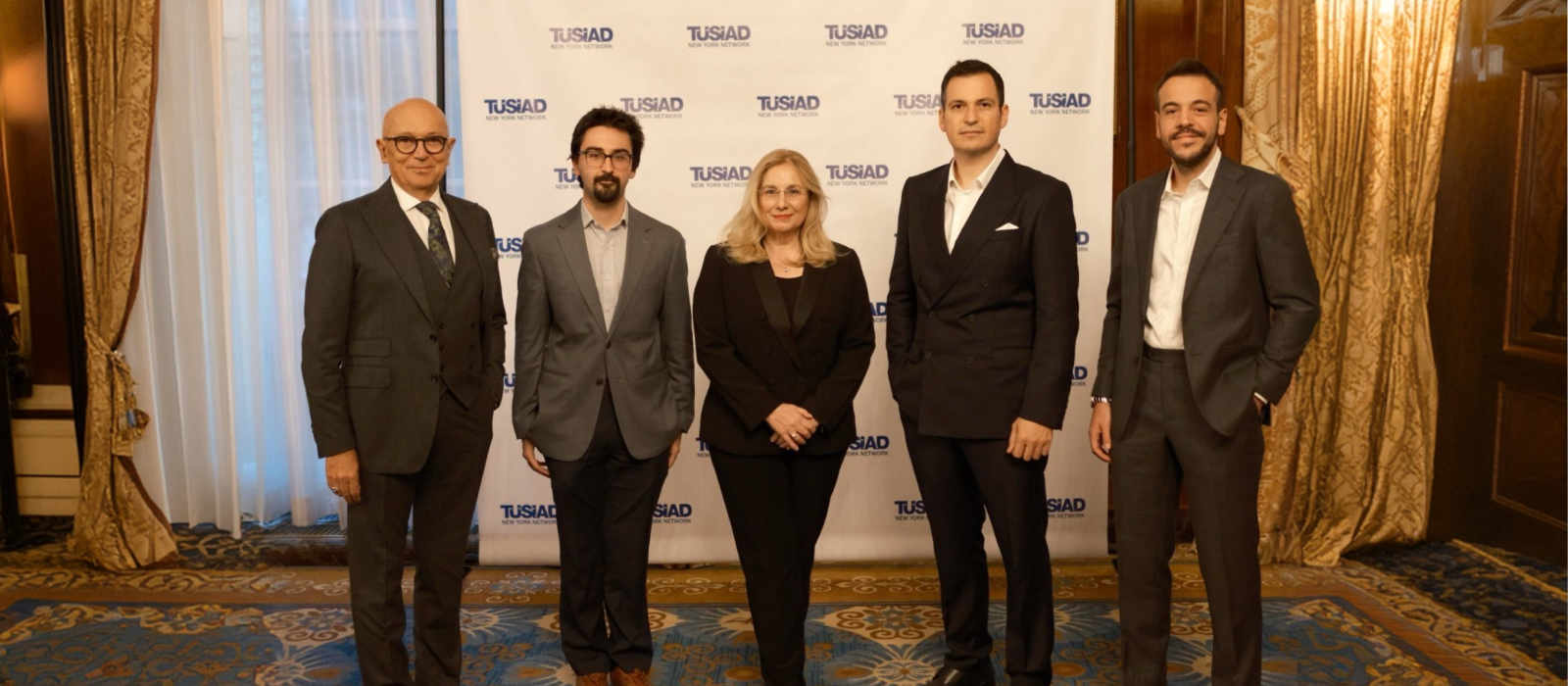 Nevzat Ataklı, second from right, with participants at a TÜSİAD New York event