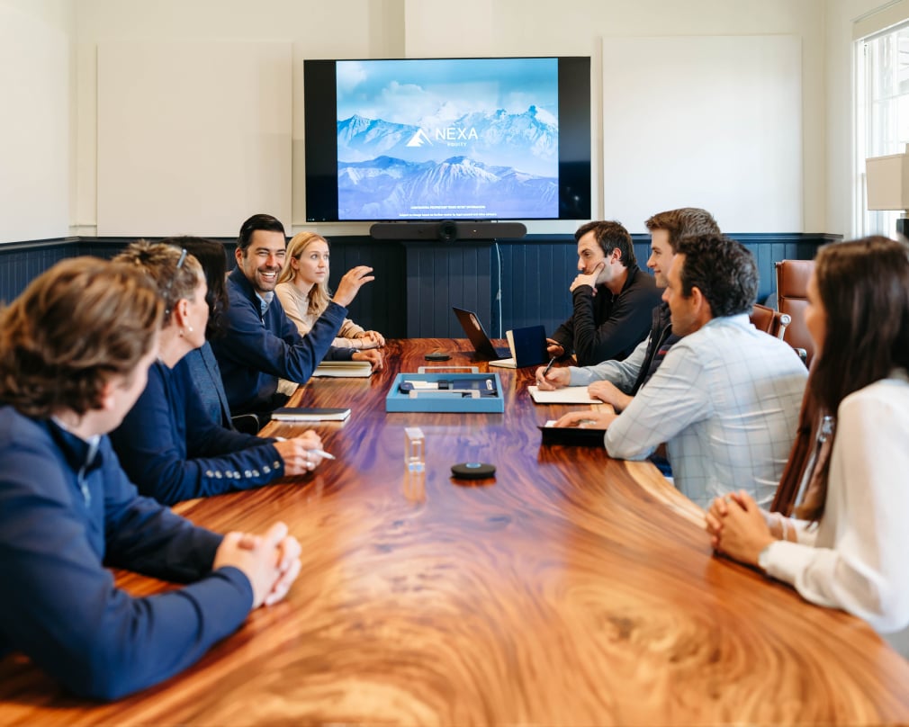Nexa colleagues meeting around a conference table