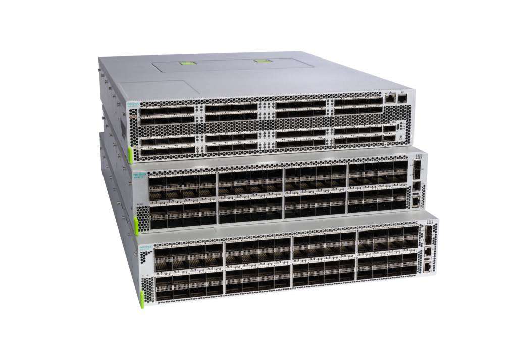 Three Nexthop network switches stacked to show their front-panel ports