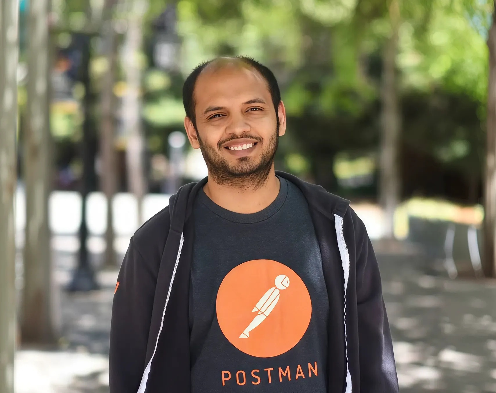 Postman co-founder and CEO Abhinav Asthana wearing a Postman sweatshirt