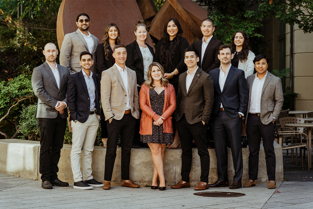 Nhan Nguyen Le with the Valiance Capital team in an outdoor group photograph