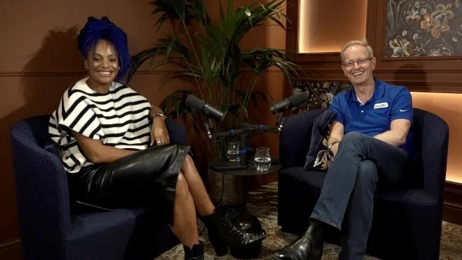 Lucy Hedges and Nick Eatock seated with microphones for an intelliflo interview