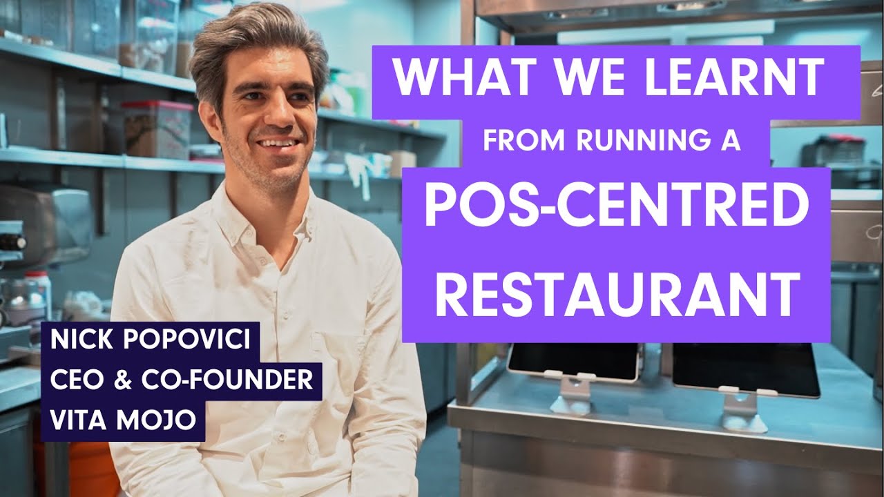 Nick Popovici seated in a restaurant kitchen in Vita Mojo’s video about its operating experience