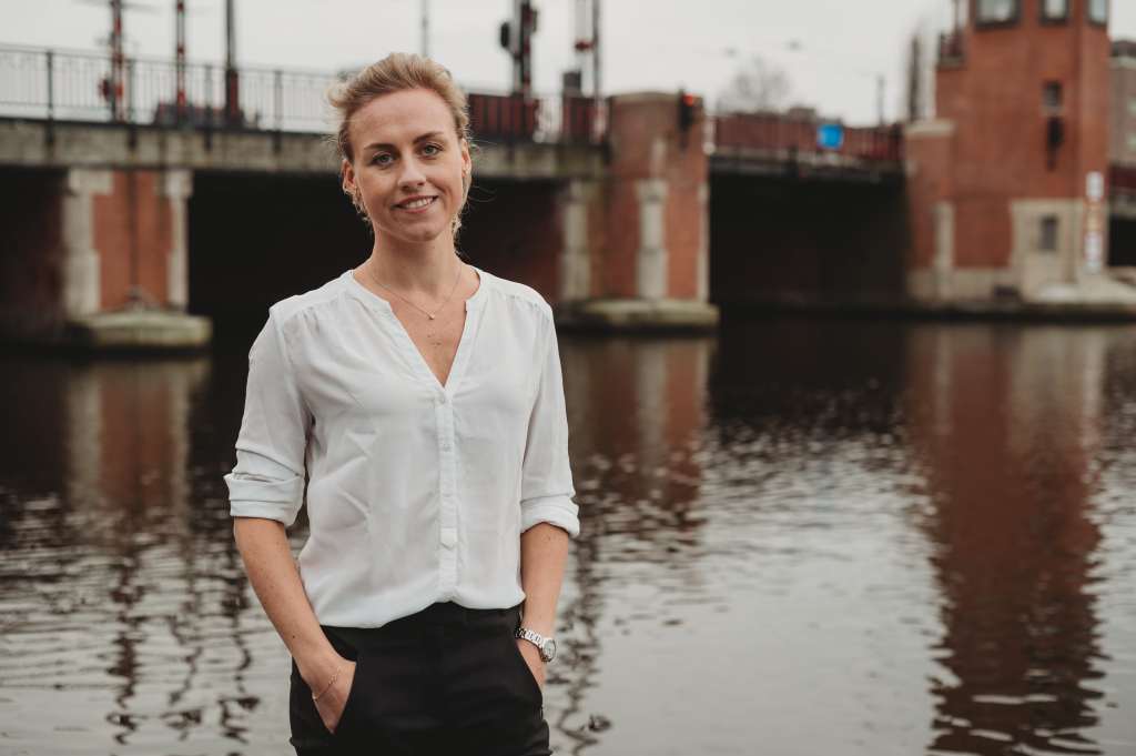 Nicola Ebmeyer standing beside a canal and bridge