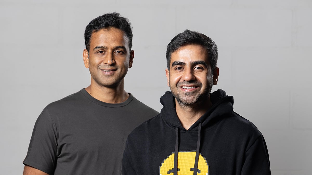 Brothers Nithin Kamath and Nikhil Kamath standing together