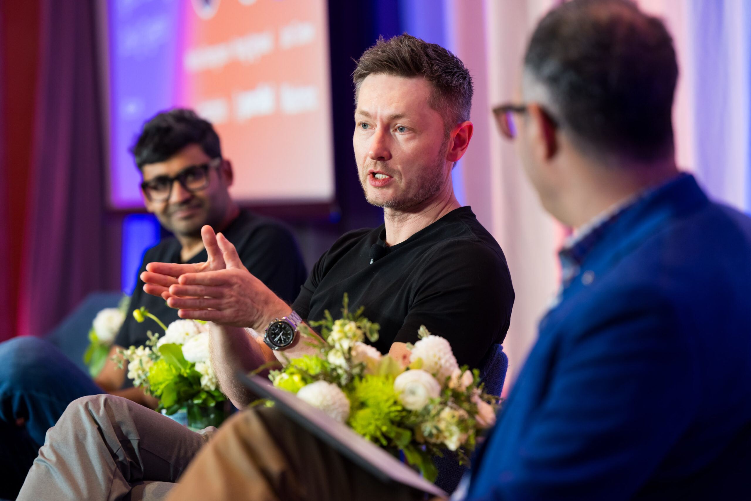Nikita Shamgunov speaking at the 2025 IA Summit, with Parag Agrawal and Jon Turow