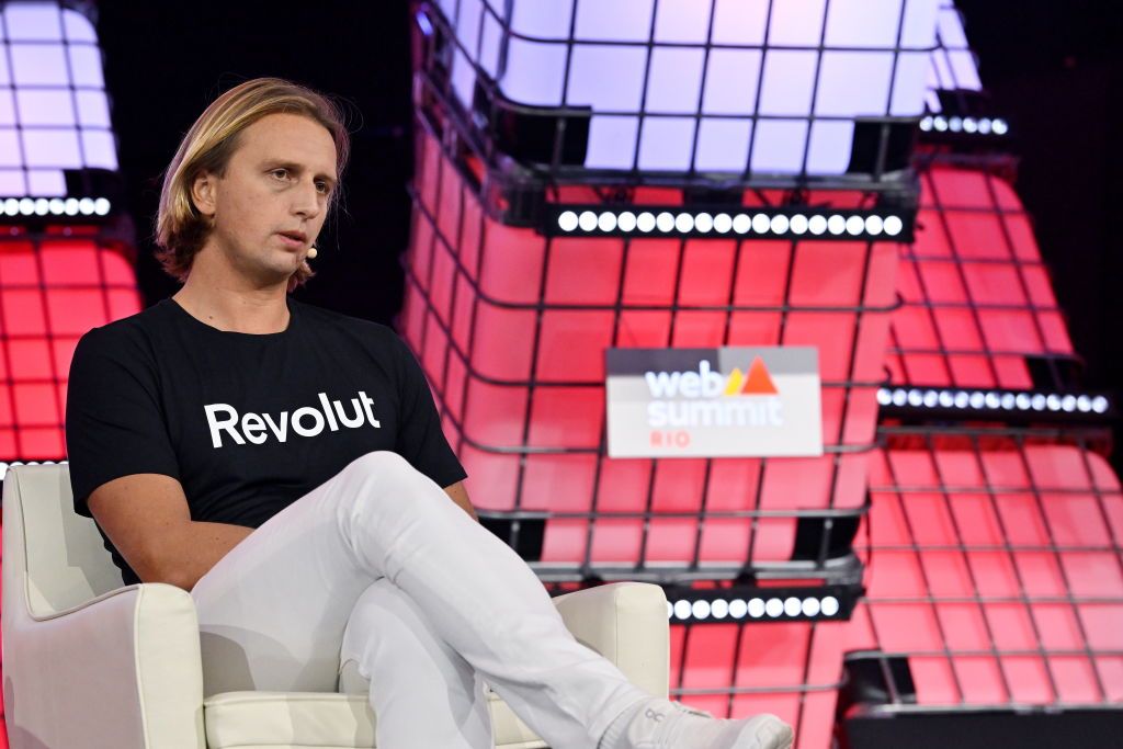 Nik Storonsky speaking onstage at Web Summit Rio in a black Revolut T-shirt
