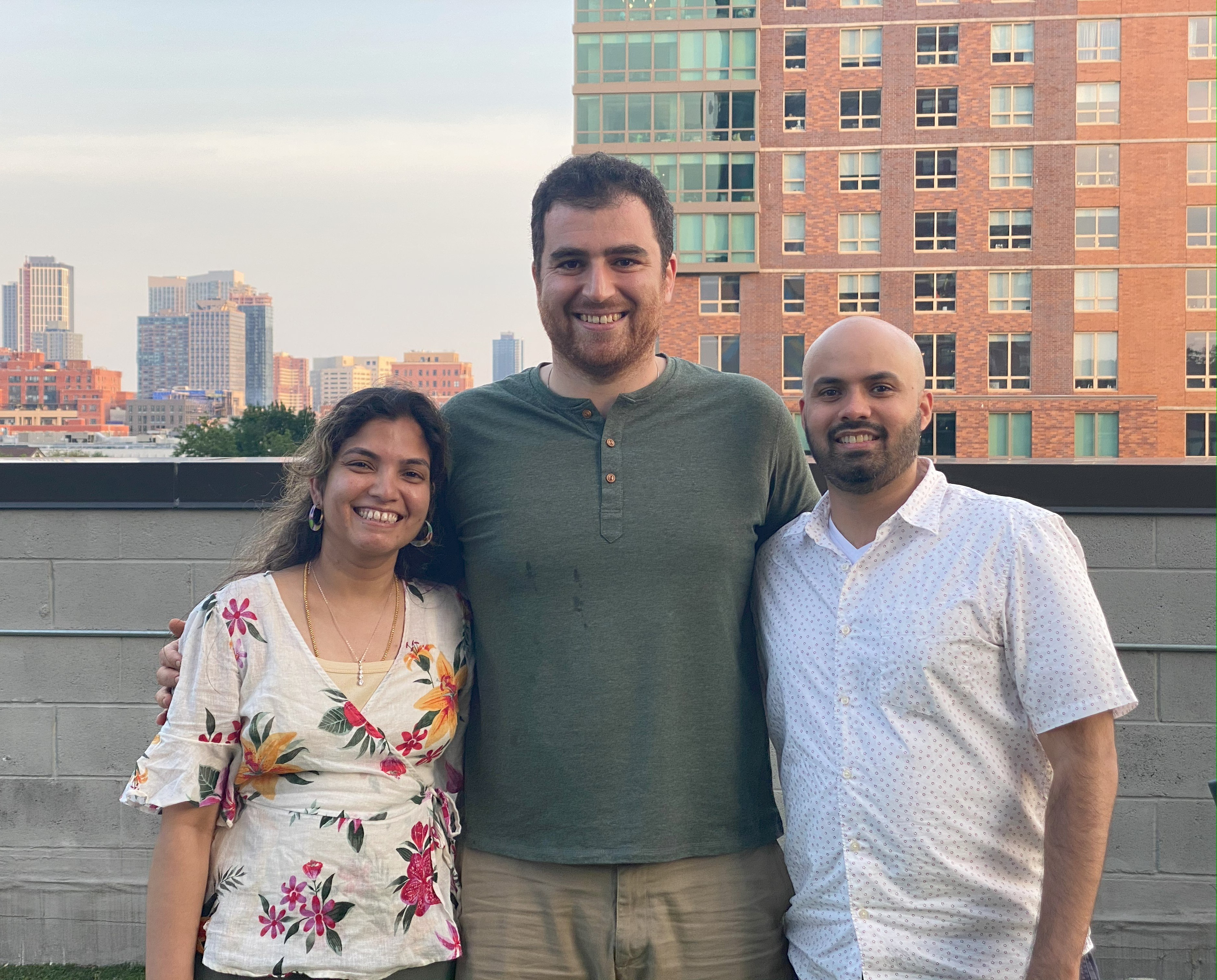 Blooming Health co-founders Kavitha Gnanasambandan, Nima Roohi Sefidmazgi, and Naman Gupta standing together outdoors