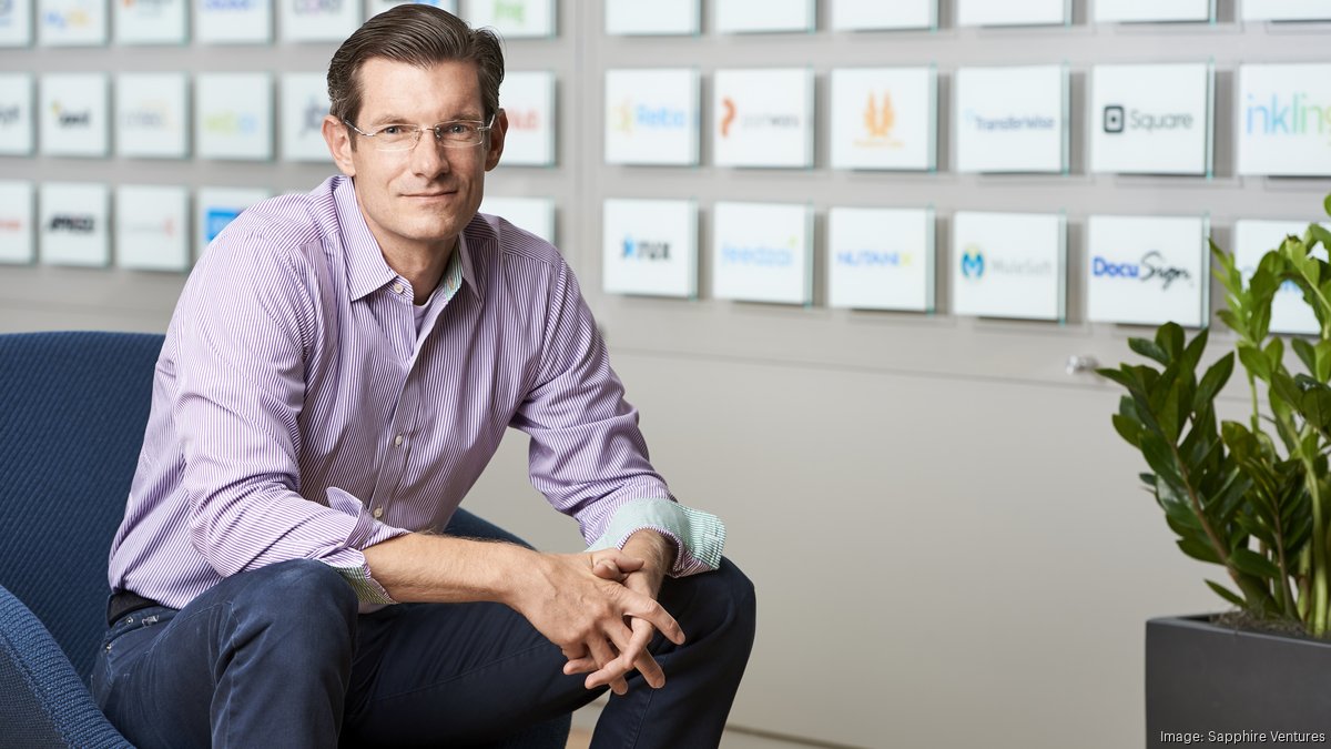Nino Marakovic seated in a Sapphire Ventures office, with portfolio company logos on the wall behind him.