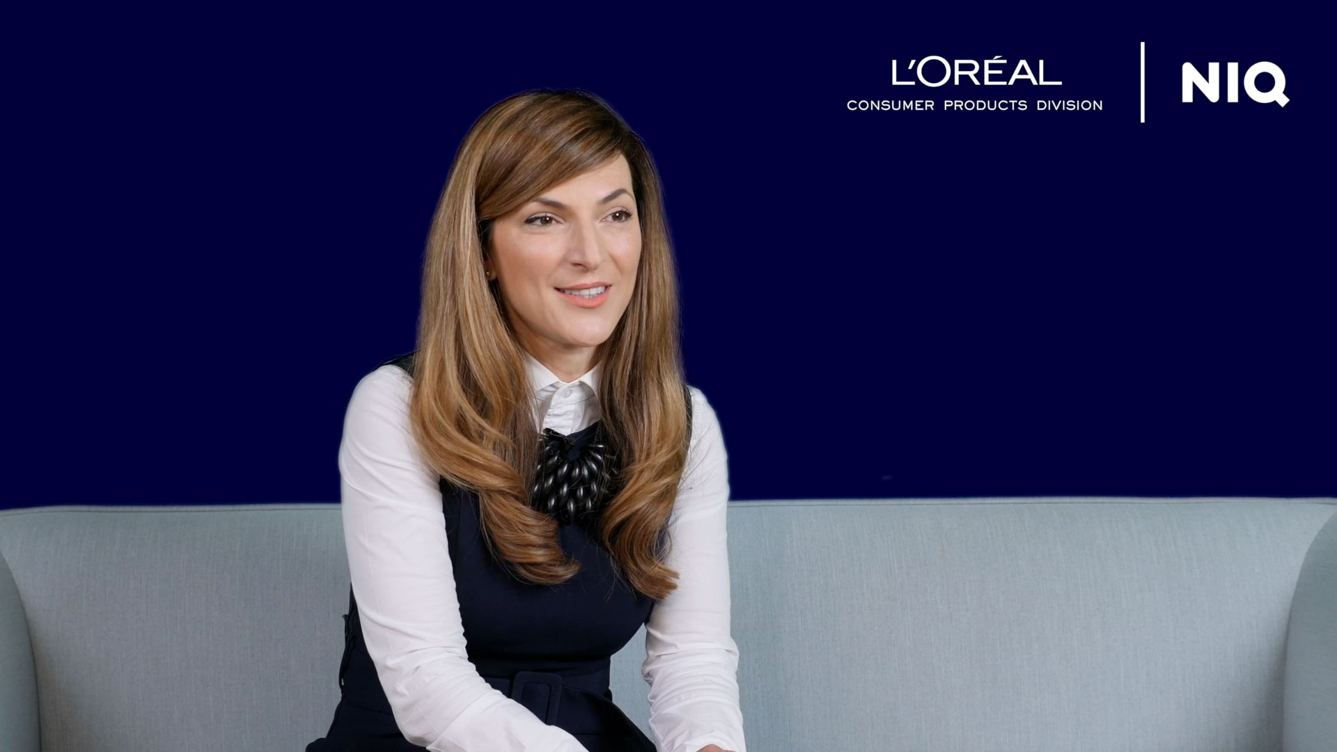 Emilia Simonin of L’Oréal Consumer Products Division speaking in an NIQ customer interview