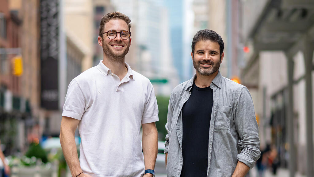 Sedric co-founders Eyal Peleg and Nir Laznik standing together on a city street