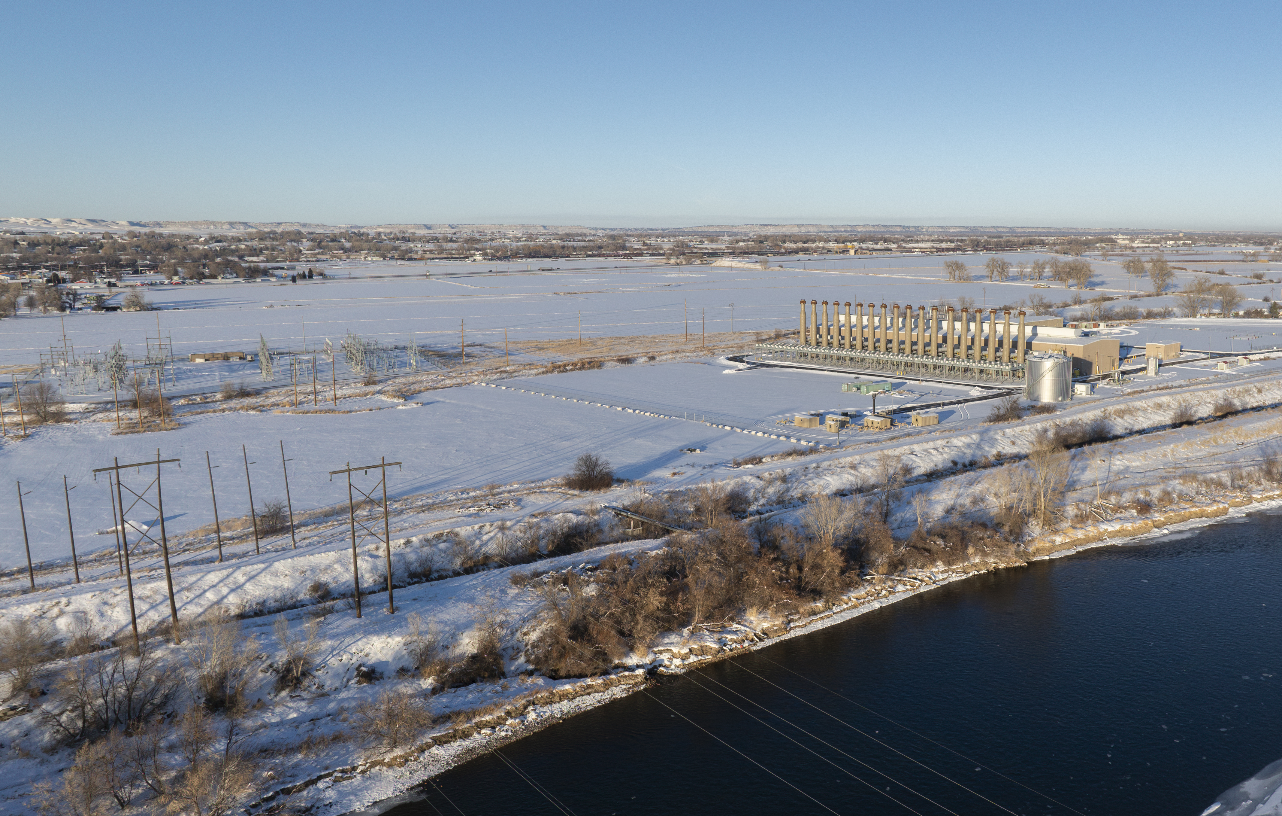Yellowstone County Generating Station beside the river in a snow-covered Montana landscape