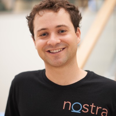 Nostra founder and CEO Arthur Root wearing a Nostra T-shirt
