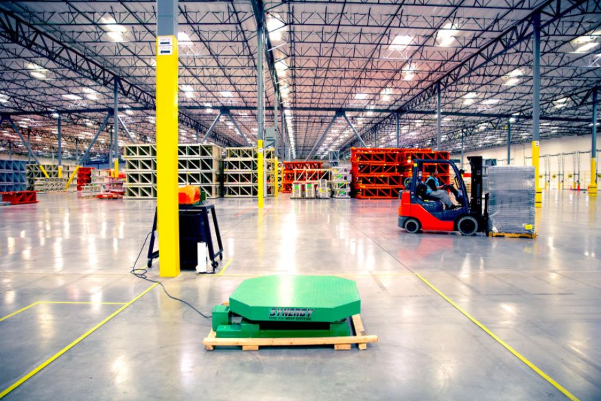 Forklift and storage racks in Novo’s warehouse, with marked lanes and yellow columns