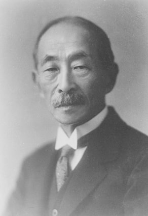 Historical black-and-white portrait of NSK founder Takehiko Yamaguchi