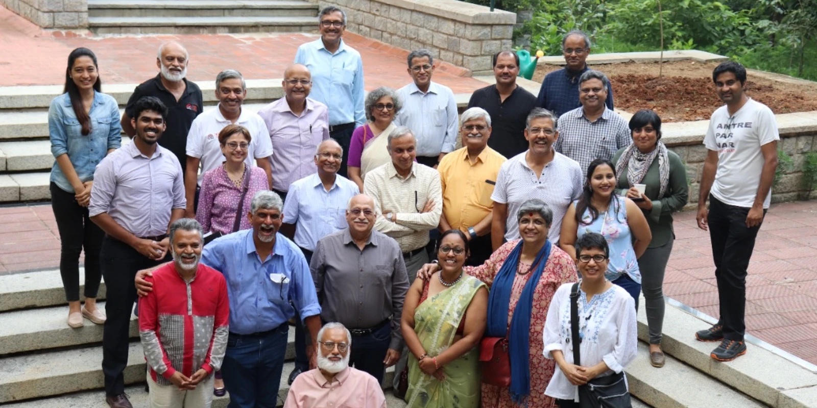 Group photograph on outdoor steps published with NSRCEL’s advice about using its network